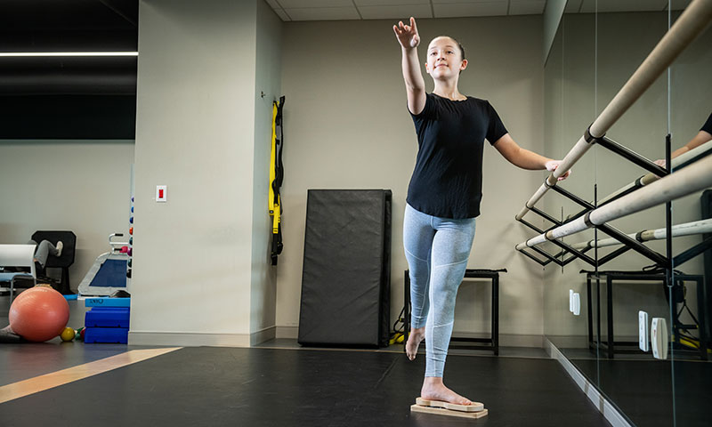 Young girl in ballet position